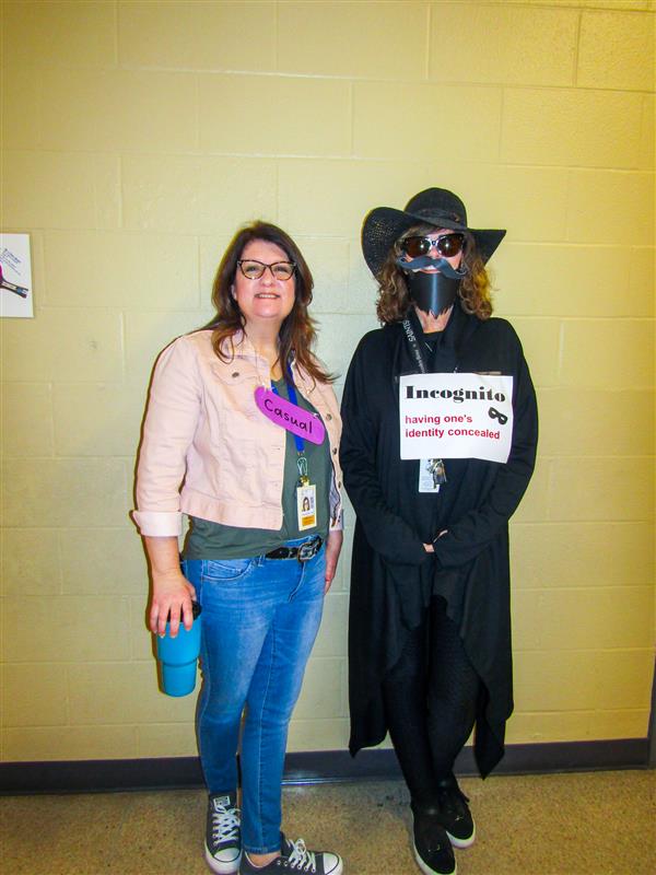 Students and teachers dressing up for a vocabulary parade. 